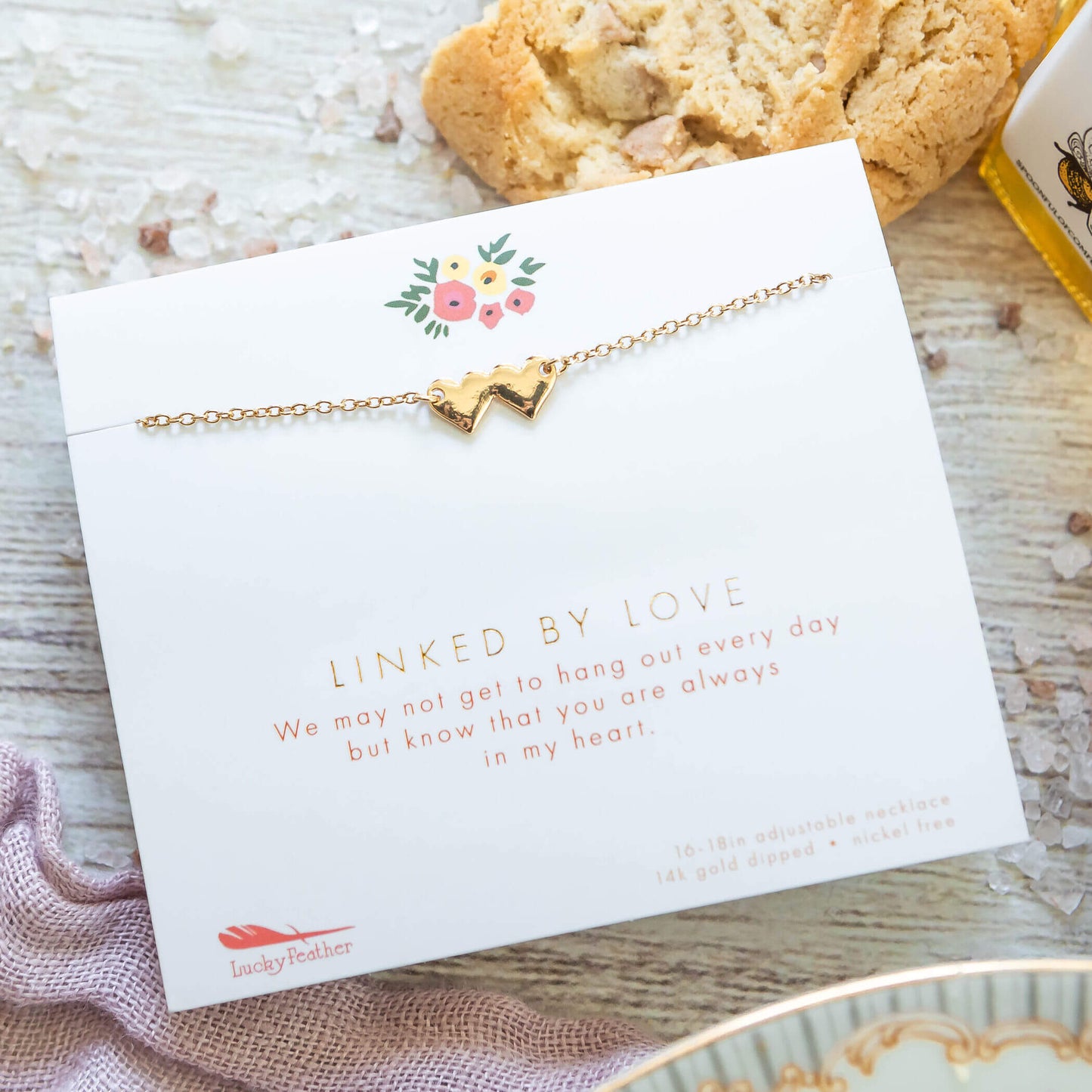 Linked By Love Necklace. Two heart conjoined on a chain. Linked By love we may not get to hand out everyday but know you always in my heart. 16-18 in. adjustable necklace. 14 k gold dipped nickel free
