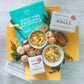 New Parent Package, Two bowls of soup surrounded by rolls and cookies. Also surrounded by a ladle and roll and cookie boxes. Includes insert that reads: Night-Time Feedings are looking up