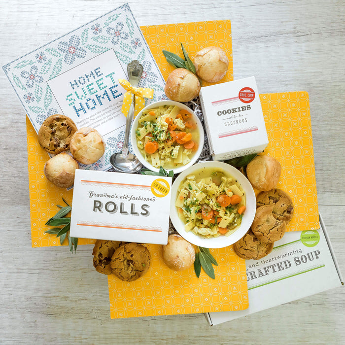 Housewarming Package: Two bowls of chicken noodle soup surrounded by rolls and cookies. Ladle and insert in image Insert reads: Home Sweet Home