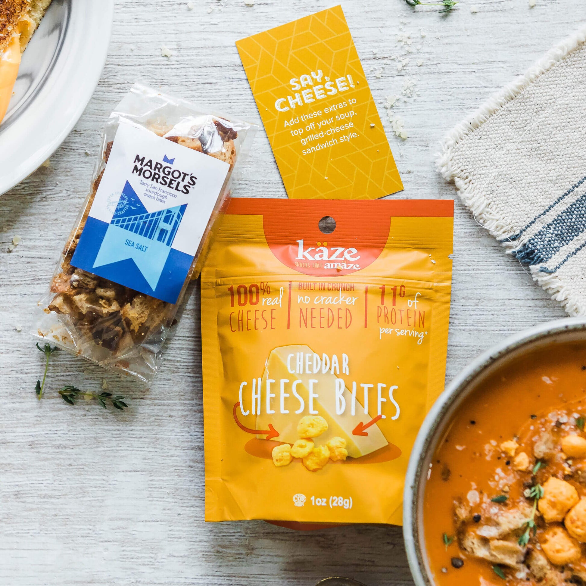 Grilled Cheese Toppers, Margot's Morsels Sea Salt Croutons and Kaze Cheddar Cheese Bites. Insert card included that reads: Say Cheese! Add these extras to top off you soup grilled-cheese sandwich style